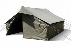 Green canvas tent on grass with trees in the background