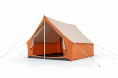 camping tent set up outdoors with trees in the background